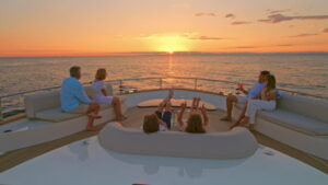 people enjoying in luxury yachts for sale